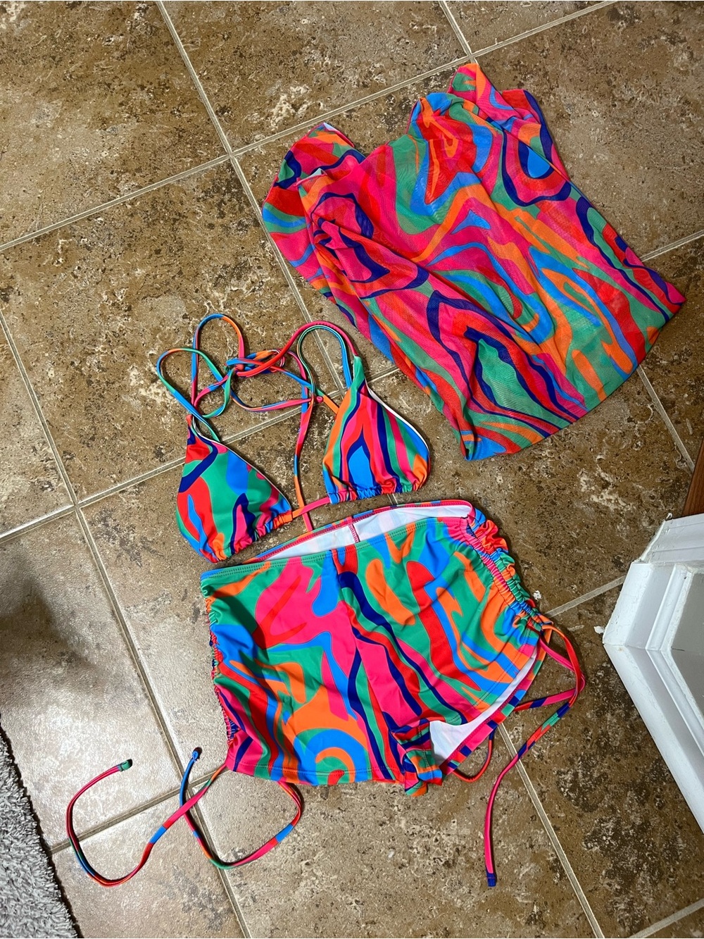 NOVA Bright colored bikini with cover up.